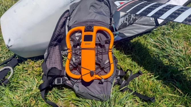 Hoverair aqua strapped to a backpack
