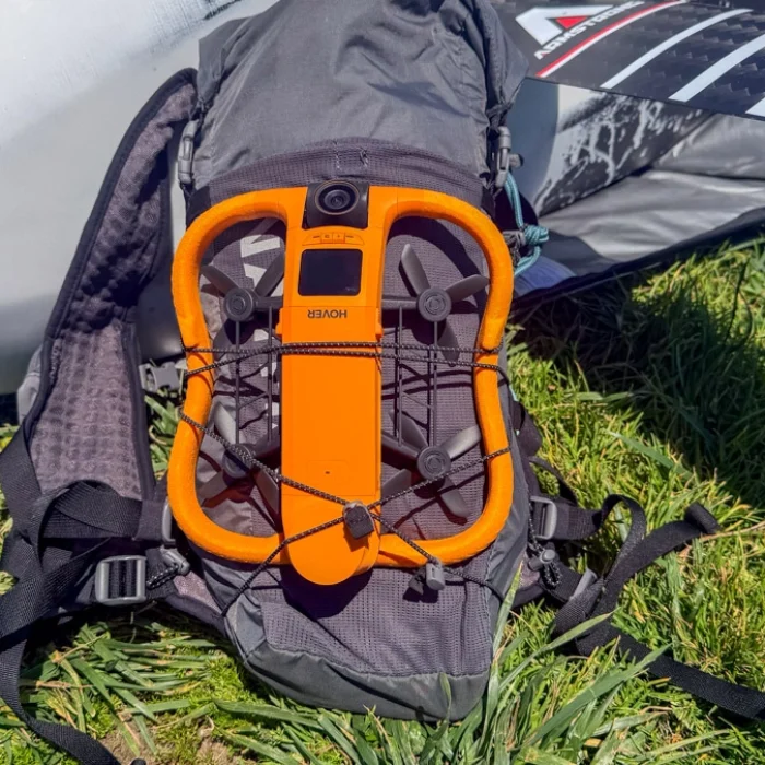 Hoverair aqua strapped to a backpack
