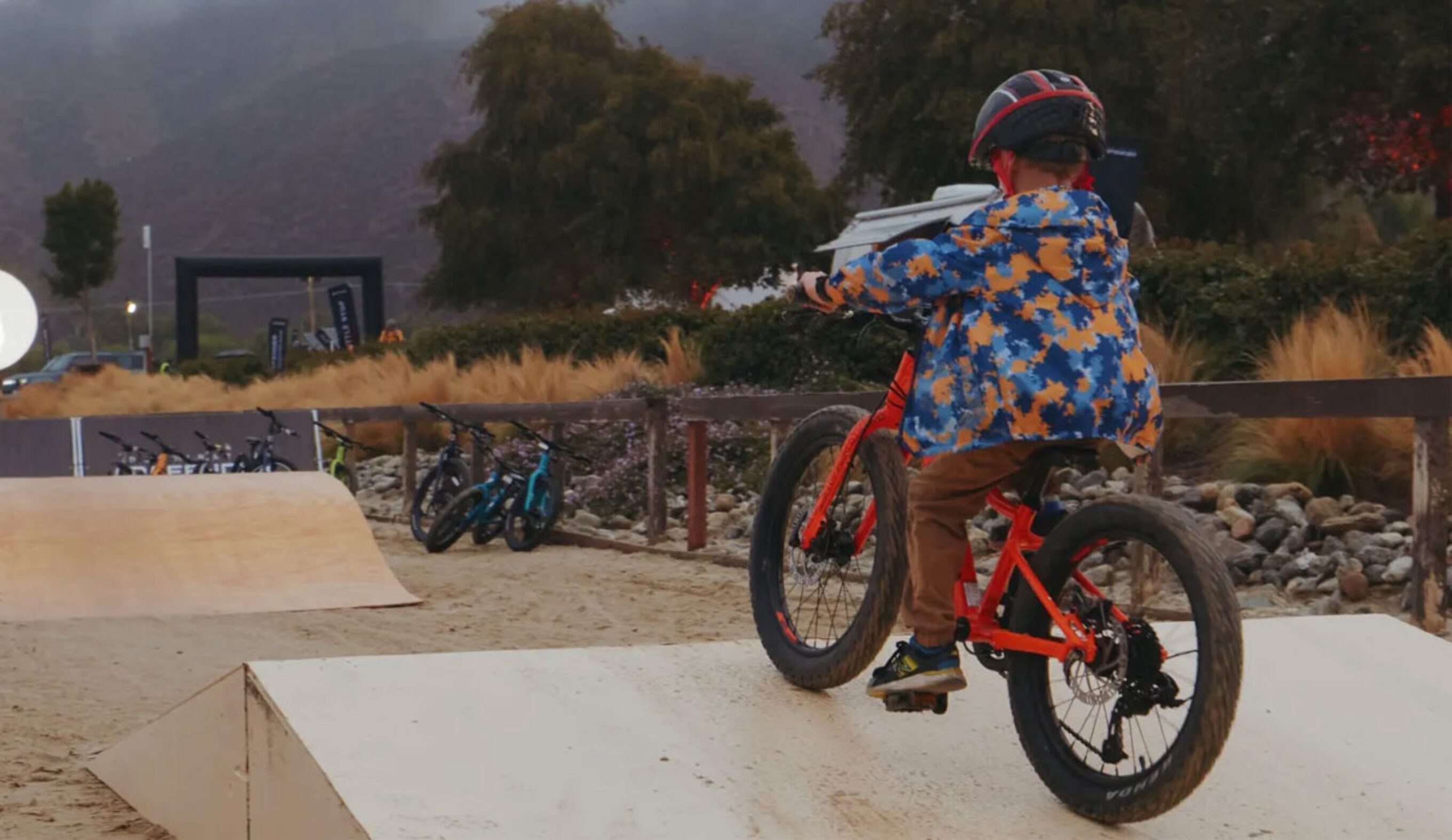 a boy riding a bike