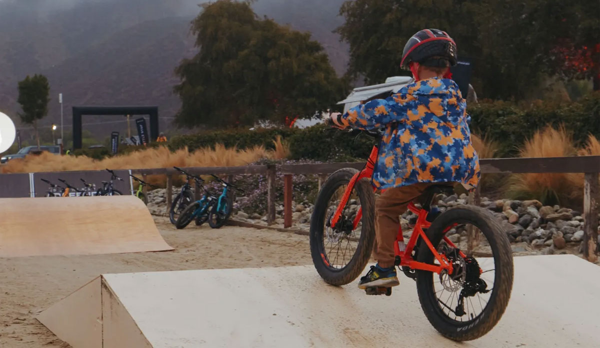 a boy riding a bike