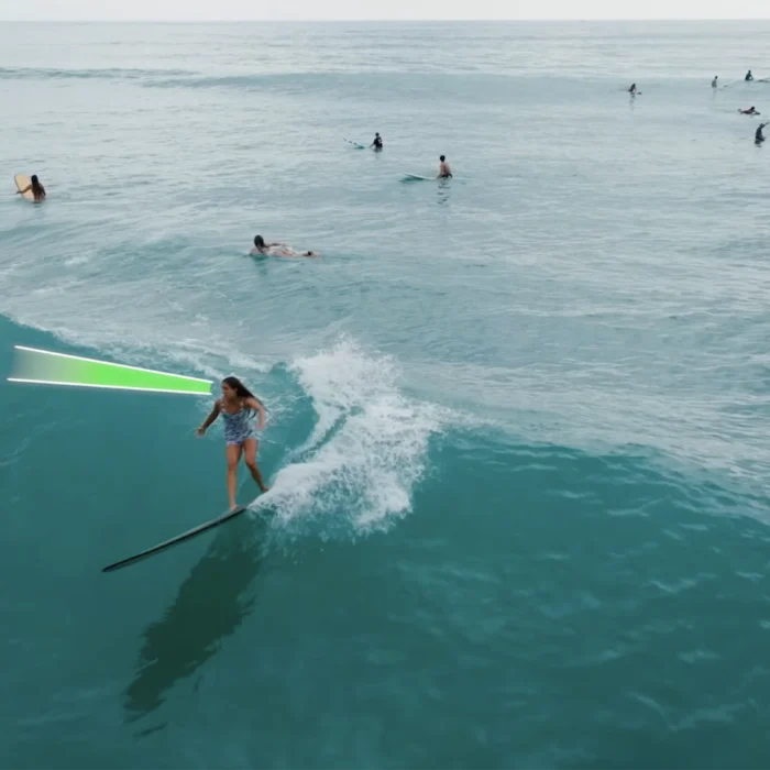 Bella Eberz on a longboard