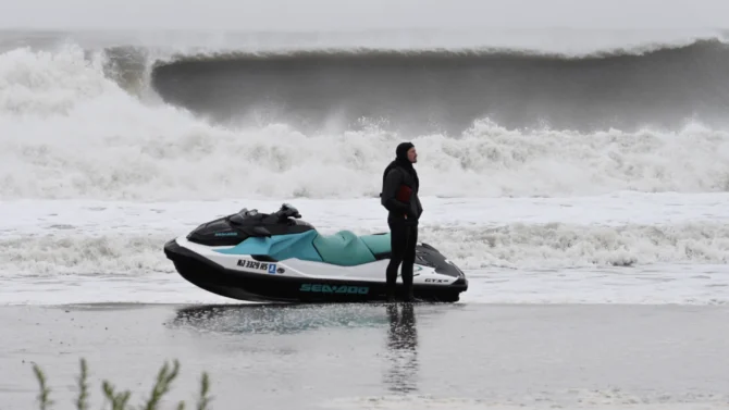 Ben Gravy on New Jersey beach with Jet Ski