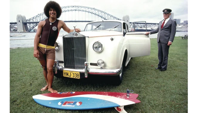 Larry Bertlemann in front of Rolls Royce