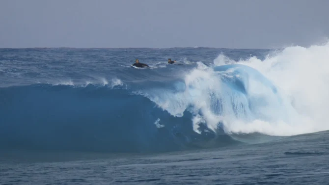 John John Florence and Nate Florence surfing a slab
