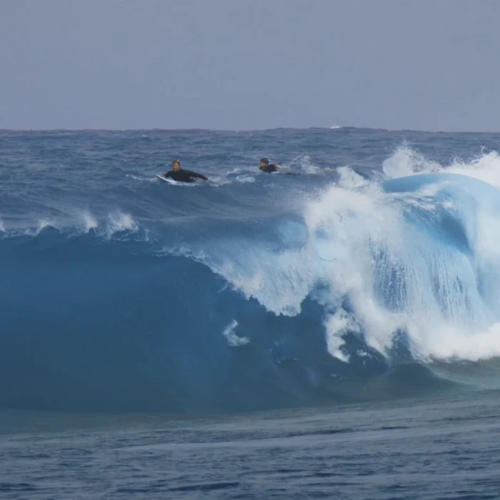 John John Florence and Nate Florence surfing a slab