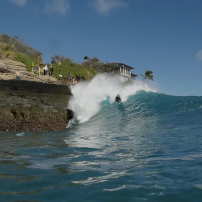 Kai Lenny surfing a surf mat at China Walls