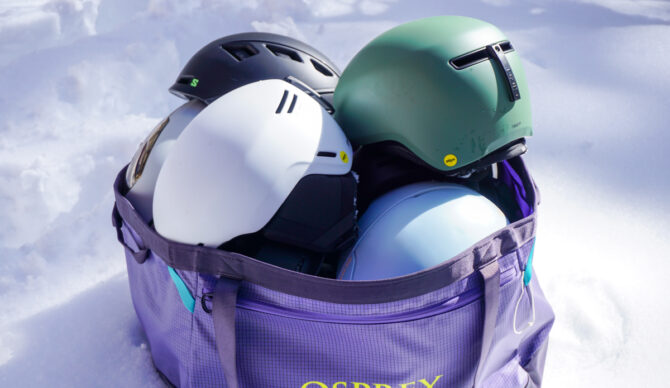 Ski Helmets in a bag on the snow
